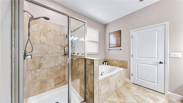 bathroom featuring separate shower and tub