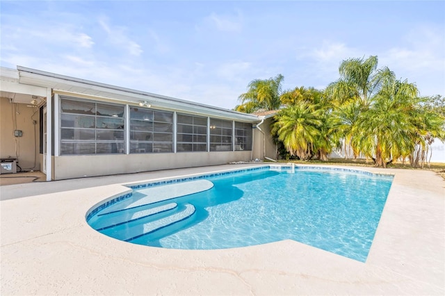 view of pool featuring a patio