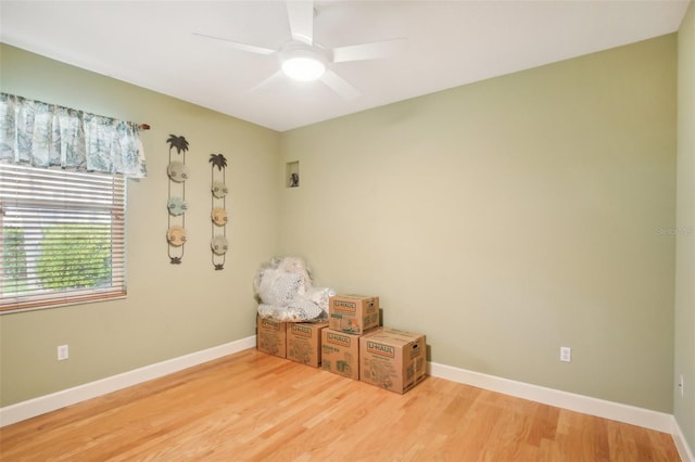 unfurnished room featuring wood-type flooring and ceiling fan