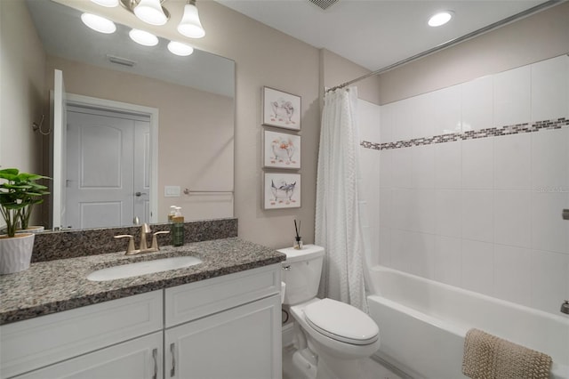 bathroom with toilet, visible vents, shower / tub combo with curtain, and vanity