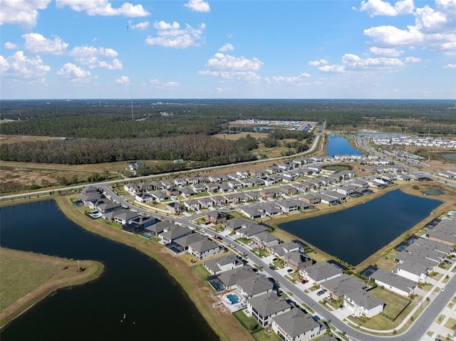 bird's eye view with a water view and a residential view