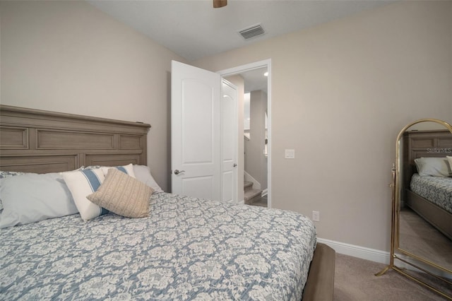 bedroom with ceiling fan, carpet, visible vents, and baseboards