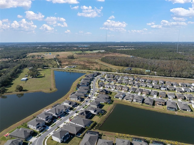 aerial view featuring a water view and a residential view