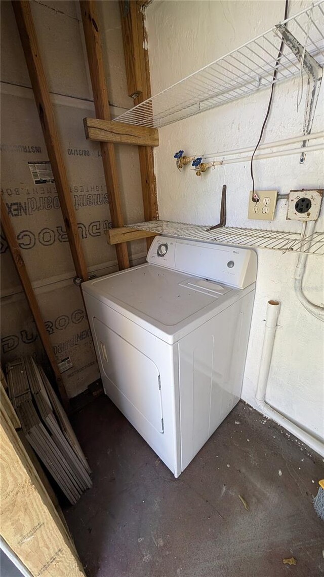 washroom featuring washer / clothes dryer