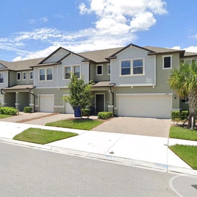 view of property with a garage