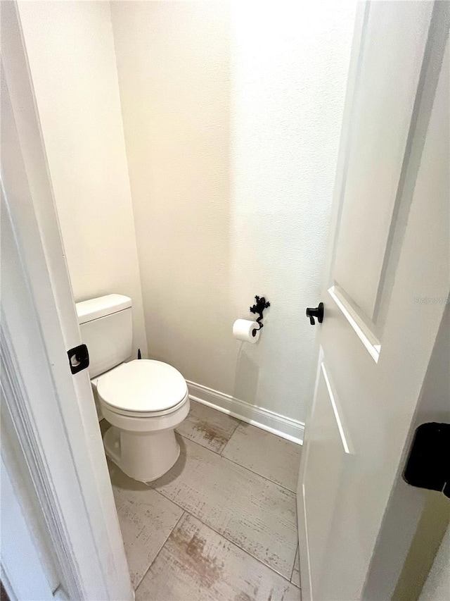 bathroom featuring toilet