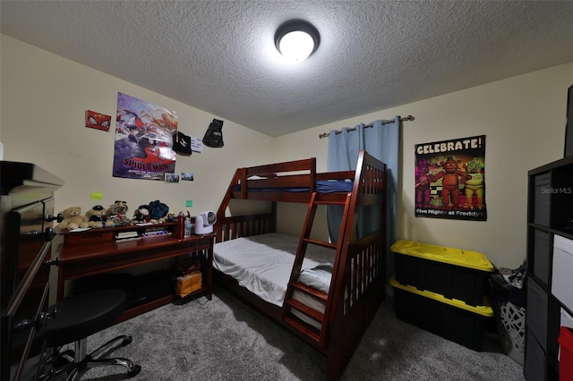 carpeted bedroom with a textured ceiling