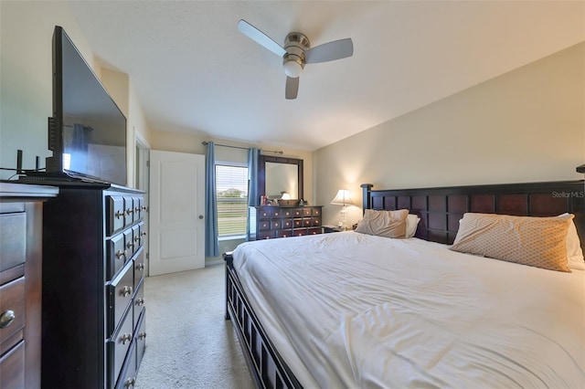 bedroom featuring light colored carpet and ceiling fan