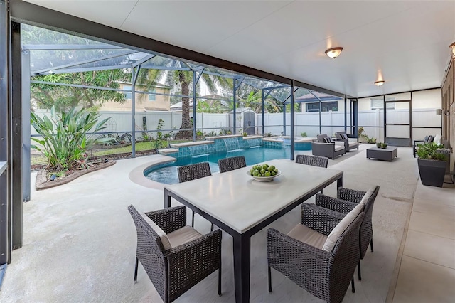 sunroom with plenty of natural light and a swimming pool