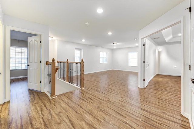 unfurnished room with light hardwood / wood-style floors