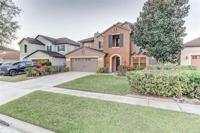 view of front of home with a garage and a front lawn