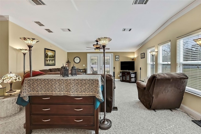 bedroom featuring ceiling fan, french doors, light colored carpet, and ornamental molding