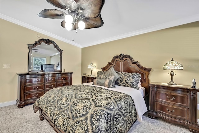 bedroom featuring ceiling fan, ornamental molding, and light carpet