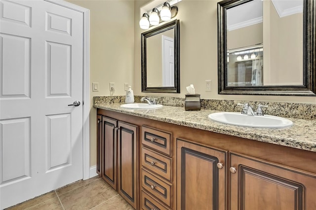 bathroom with tile patterned flooring, vanity, and ornamental molding