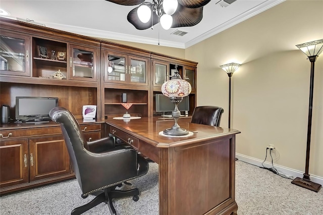 office featuring light colored carpet, ceiling fan, and crown molding