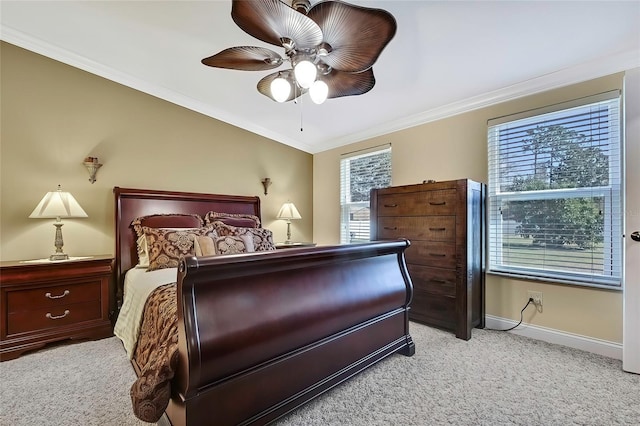 bedroom with light carpet, multiple windows, crown molding, and ceiling fan