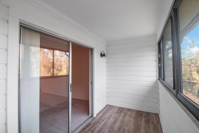 unfurnished sunroom featuring a healthy amount of sunlight