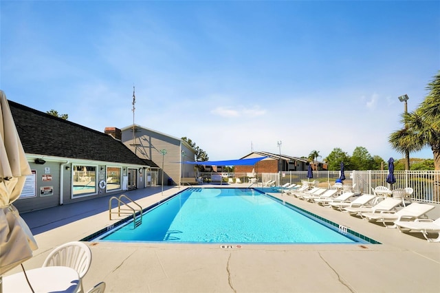 view of swimming pool featuring a patio area