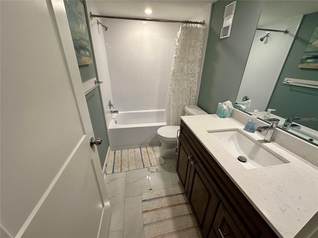 full bathroom with shower / bath combo, vanity, and toilet