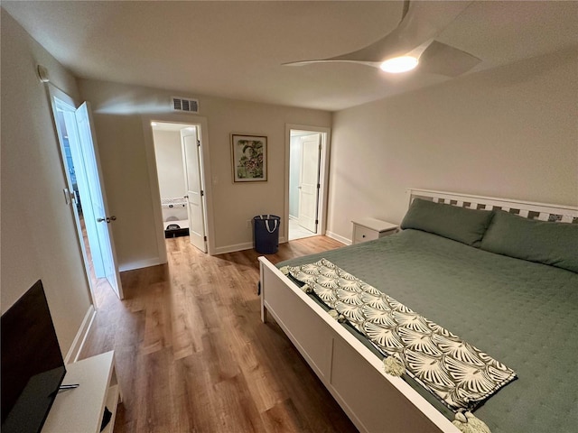 bedroom featuring ceiling fan and wood-type flooring