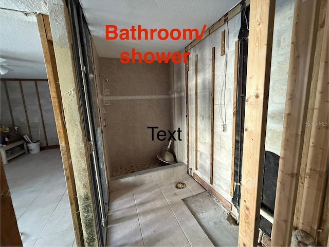 259 Medallion Blvd Unit B, Madeira Beach, FL 33708 - bathroom featuring a textured ceiling