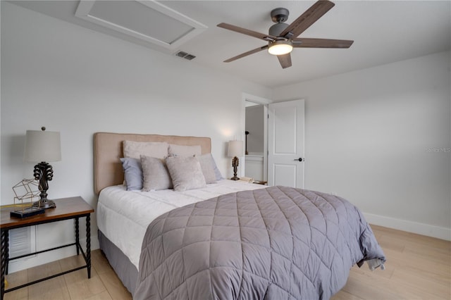 bedroom featuring ceiling fan and light wood-type flooring