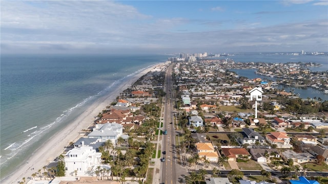 aerial view featuring a water view and a view of the beach