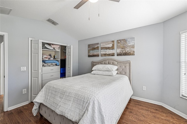 bedroom with lofted ceiling, ceiling fan, and dark wood-type flooring