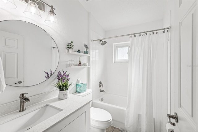 full bathroom with shower / tub combo with curtain, vanity, and toilet