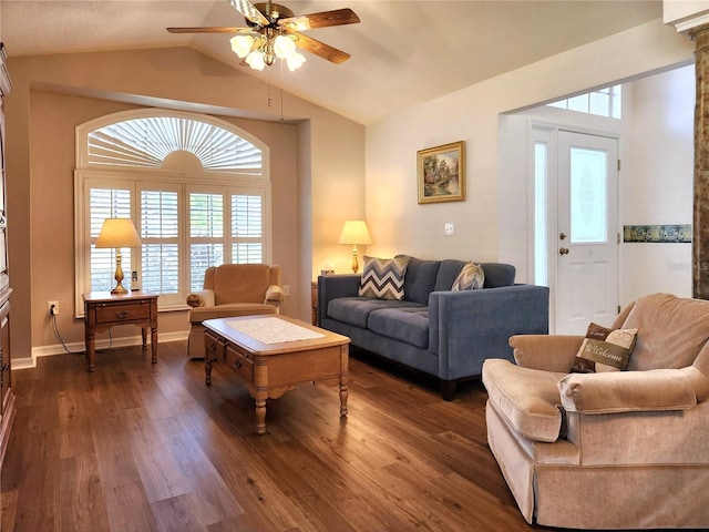 living room with ceiling fan, lofted ceiling, and dark wood-type flooring