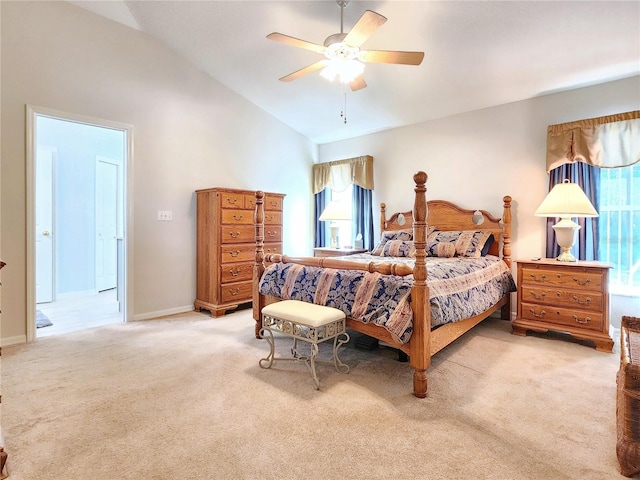 carpeted bedroom featuring ceiling fan and lofted ceiling