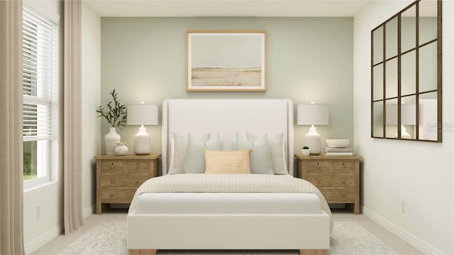 bedroom with light colored carpet