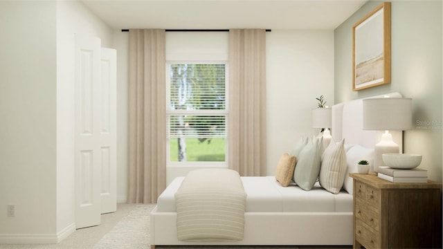 bedroom featuring light colored carpet