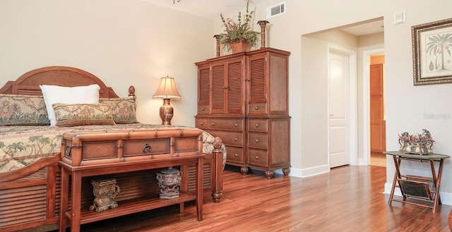 bedroom featuring hardwood / wood-style floors