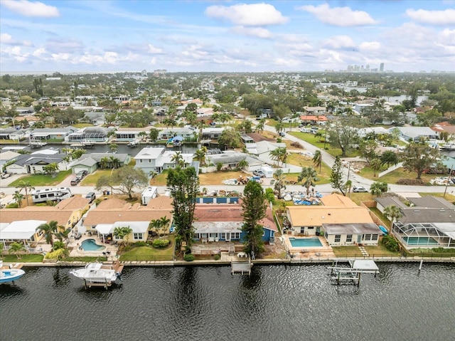 drone / aerial view with a water view