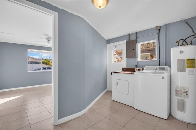 washroom featuring water heater, independent washer and dryer, light tile patterned flooring, ceiling fan, and electric panel