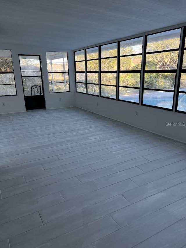 empty room with light wood-type flooring