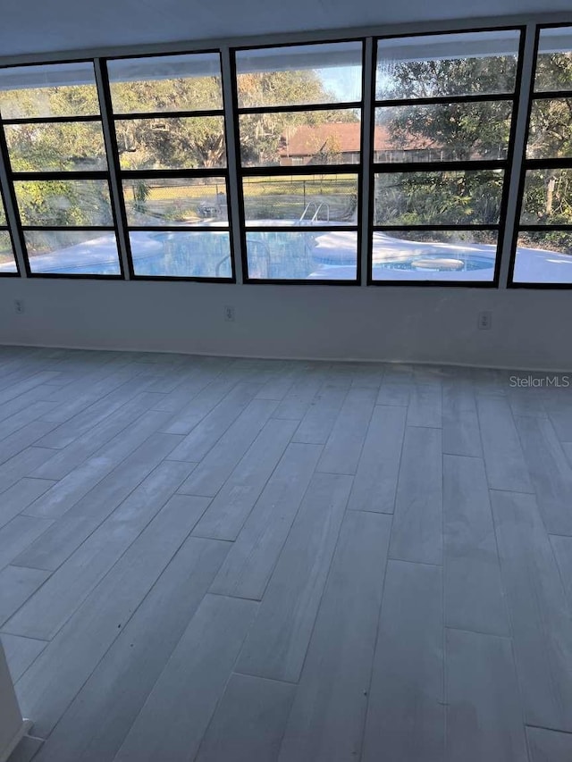 empty room featuring wood-type flooring