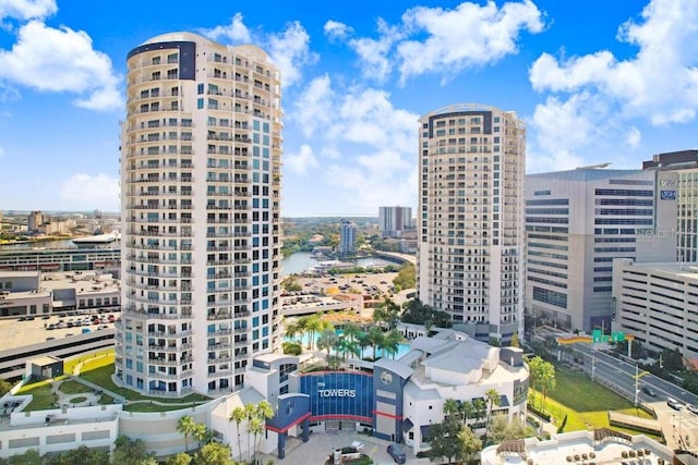 property's view of city featuring a water view