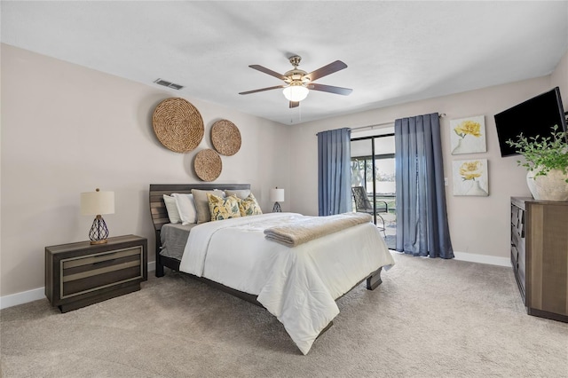 carpeted bedroom with ceiling fan and access to outside