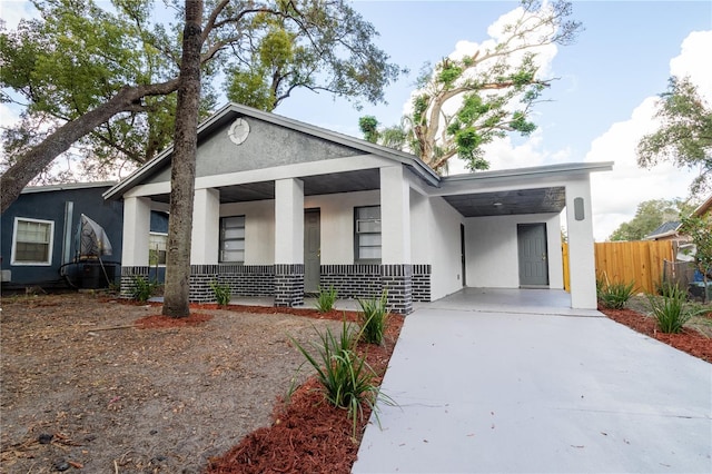 view of front of house with a carport