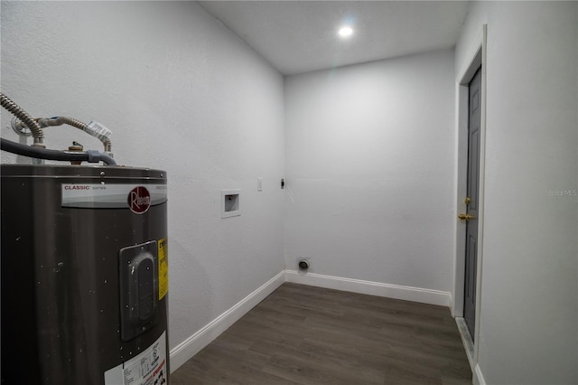 washroom with hookup for a washing machine, electric dryer hookup, dark wood-type flooring, and water heater