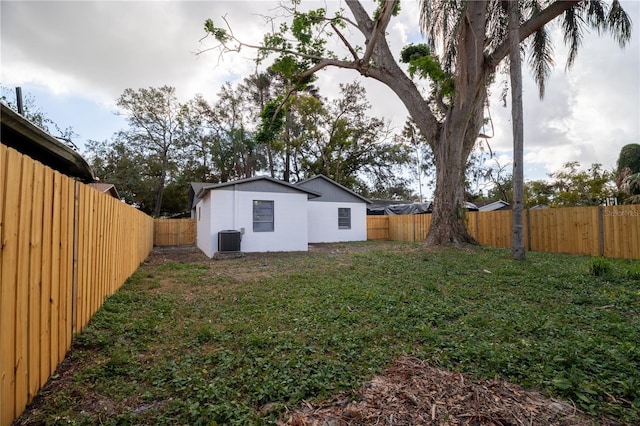 view of yard with central AC unit