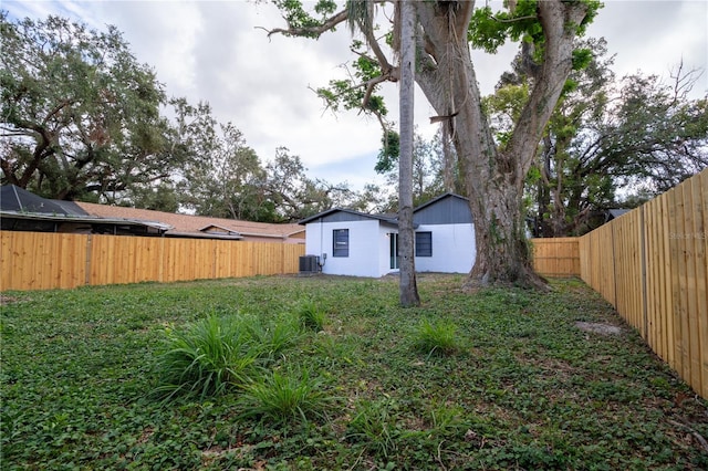 view of yard featuring central AC