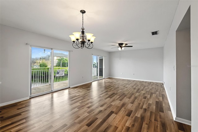 unfurnished room with dark wood-type flooring and ceiling fan with notable chandelier