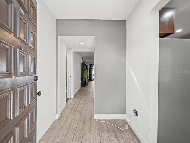 hall featuring light wood-type flooring