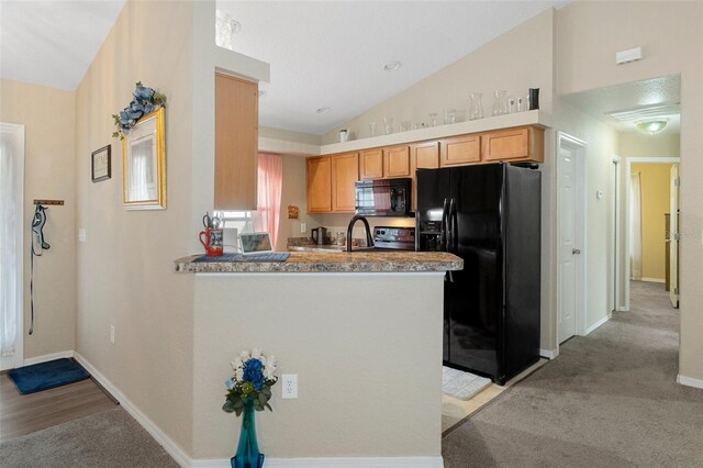 kitchen with kitchen peninsula, light carpet, high vaulted ceiling, and black appliances