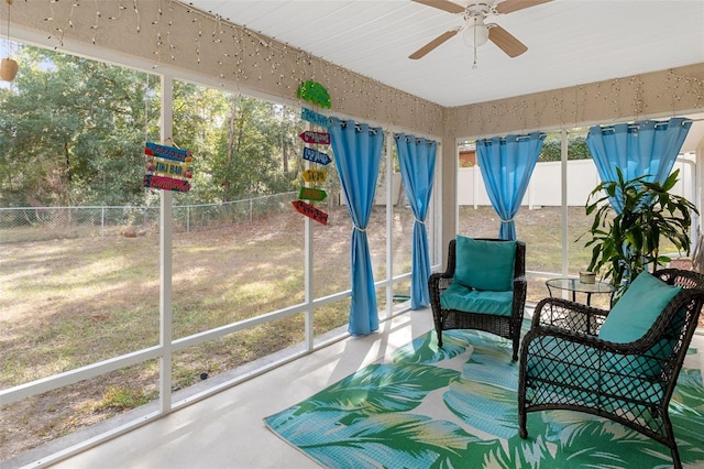 sunroom / solarium with ceiling fan