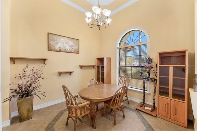 dining area with ornamental molding, light tile patterned floors, and a chandelier