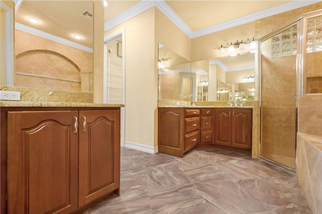 bathroom featuring vanity, a shower with door, and crown molding